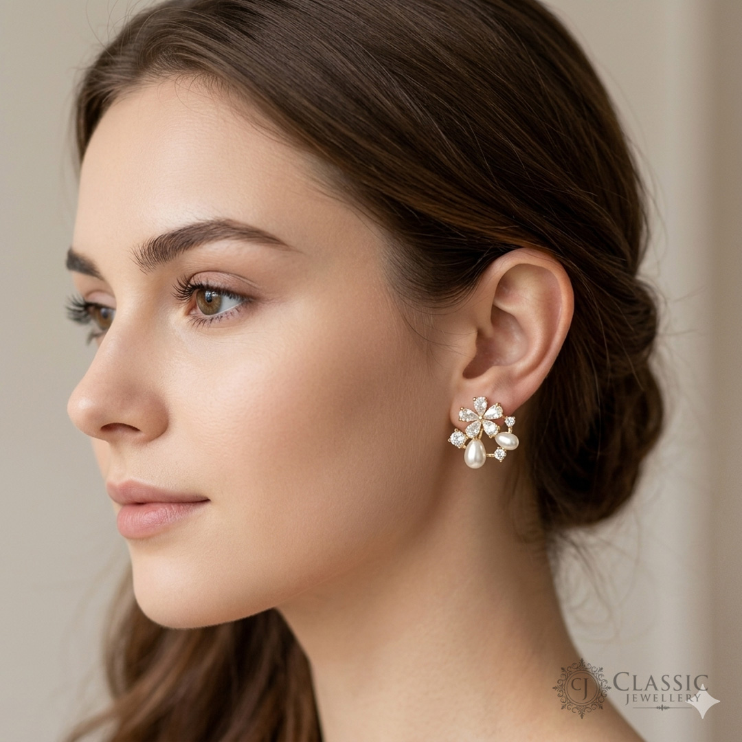 Elegant gold plated floral stud earrings with white pearls and cubic zirconia stones by Classicjewellery